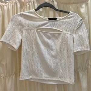 Forever 21 cream short sleeve crop top with cut out detailing. stretch fabric.